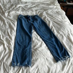 Medium/Dark wash jeans with bottom fray